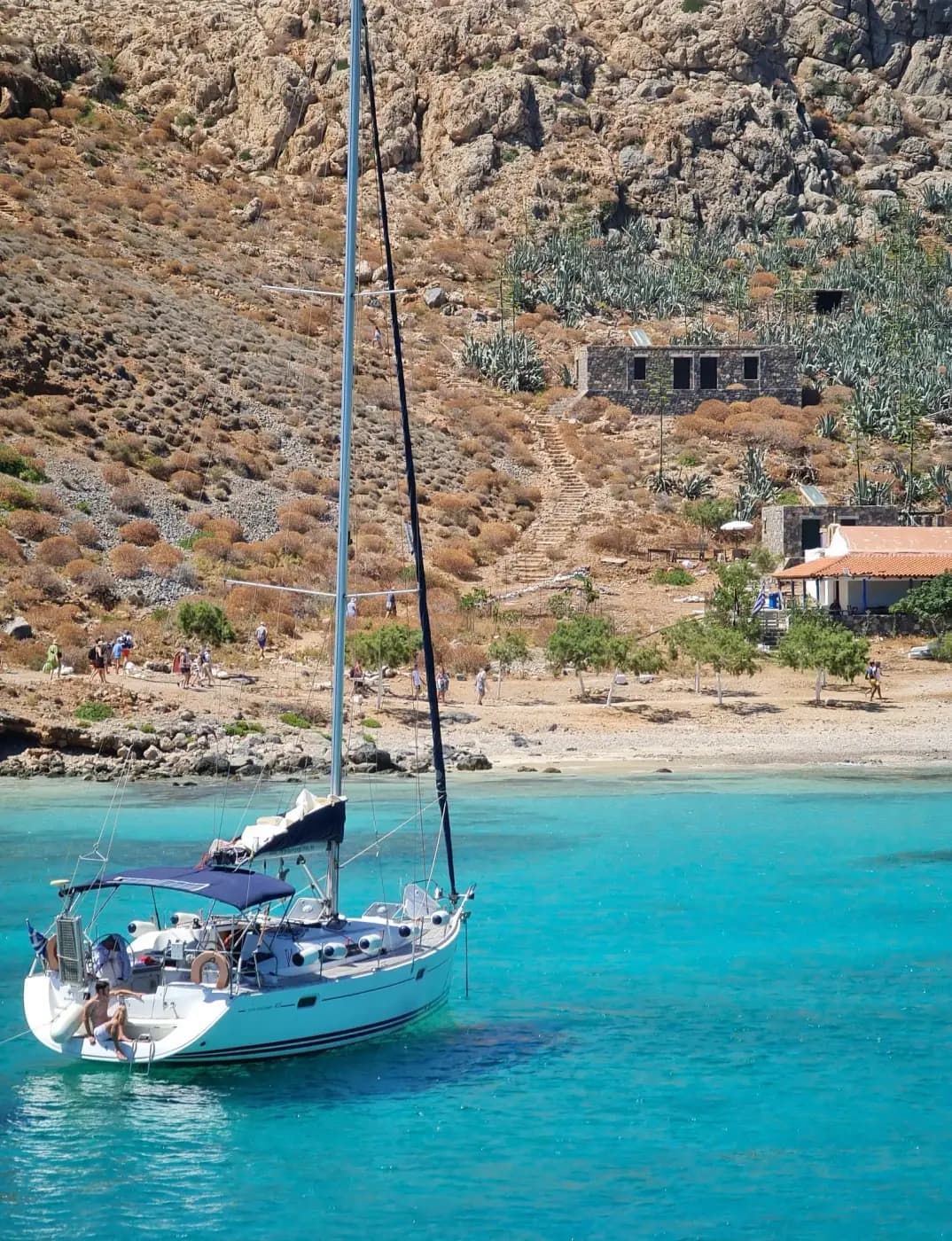 A sailing boat in clear water at Gramvousa