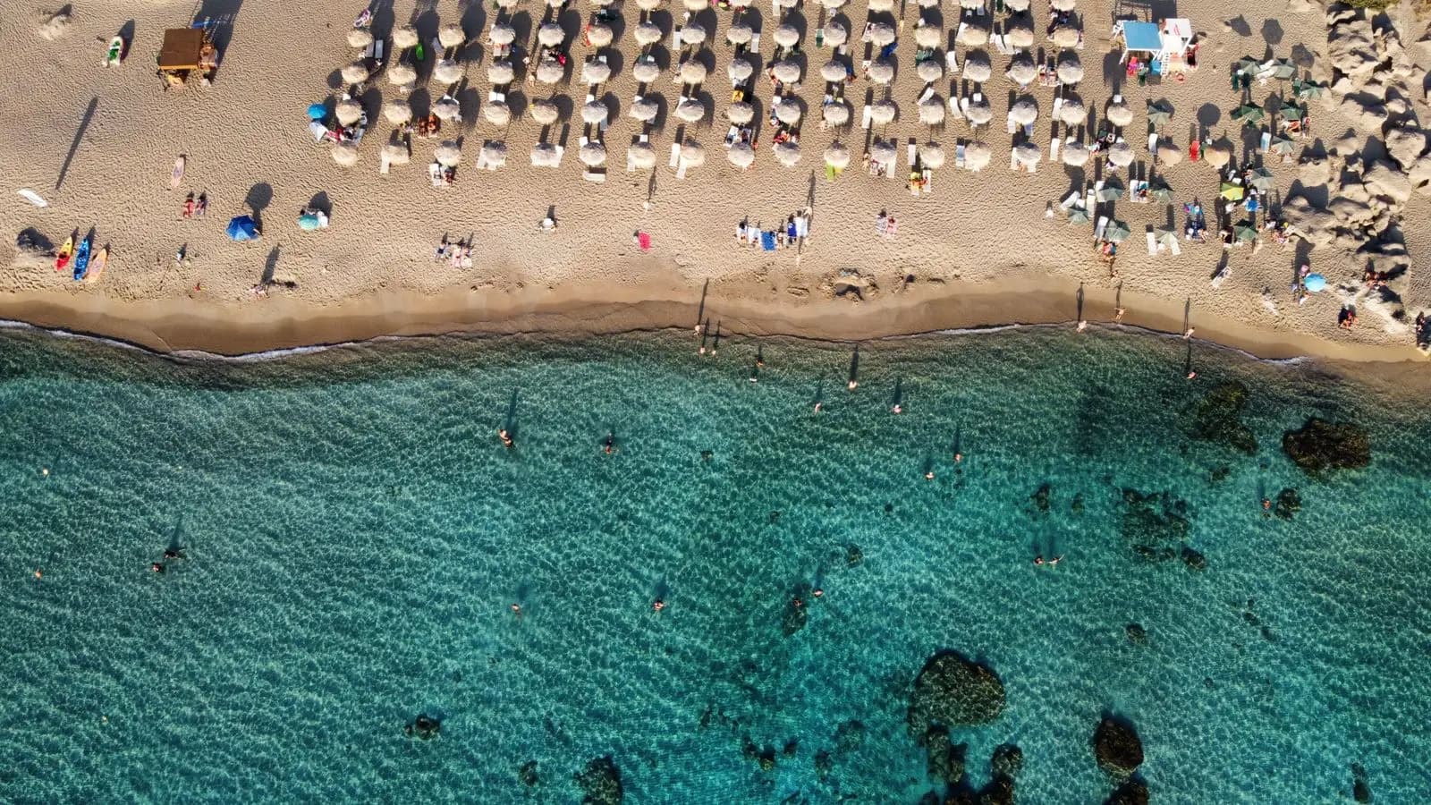 Beach umbrellas and the sea at a Chania beach