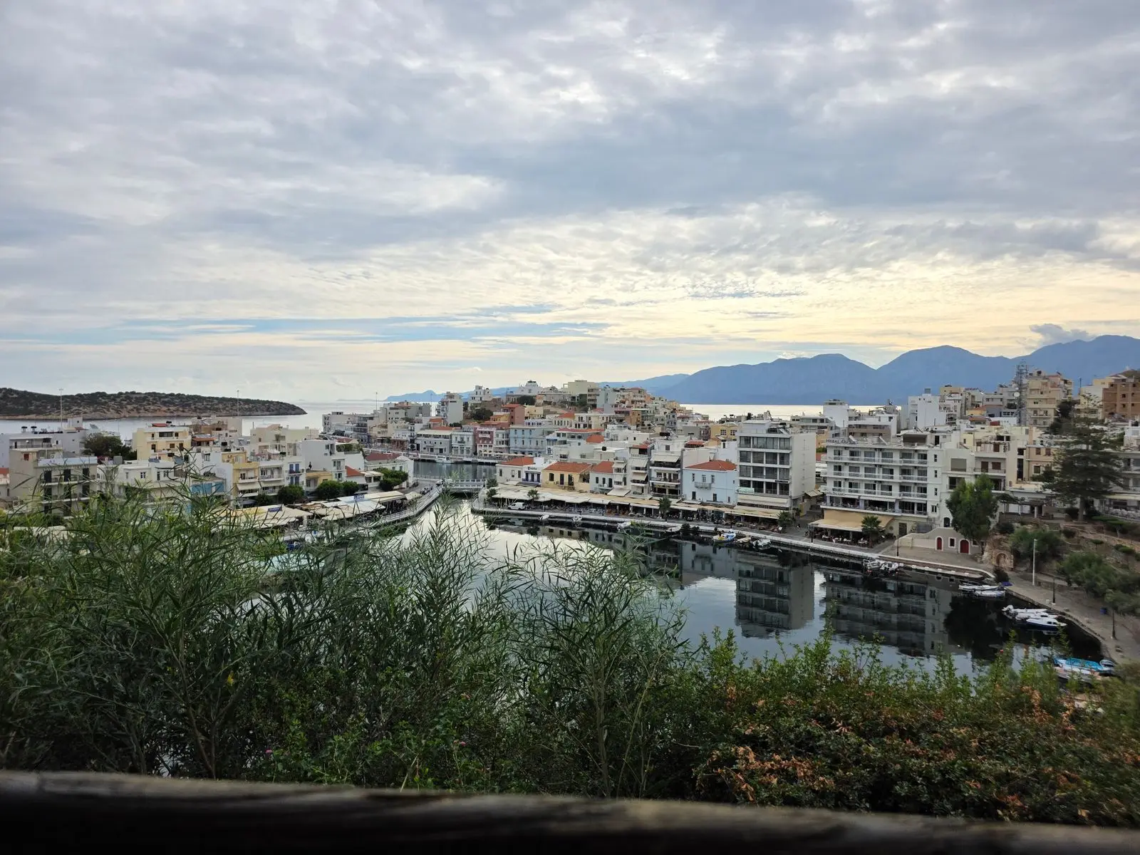 The harbour at Agios Nikolaos with the hills behind it