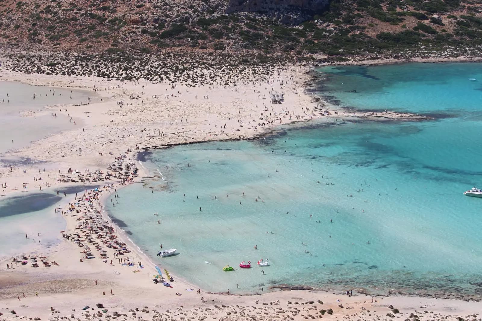 People on the sand at Balos beach